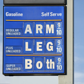 Gasoline prices : gas price sign with a humorous slant.