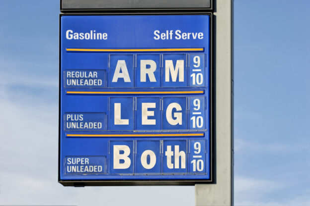 Gasoline prices : gas price sign with a humorous slant.