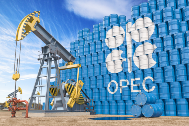 Oil pump jack and oil barrels with OPEC flag.